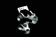5th Axis milled aluminum part used in the Optic Industry.
