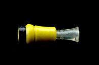 Lathed, milled and screen printed plastic duck call used in hunting.
