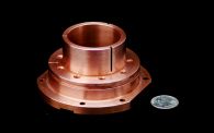Lathed and milled copper part used in the Semiconductor Industry.